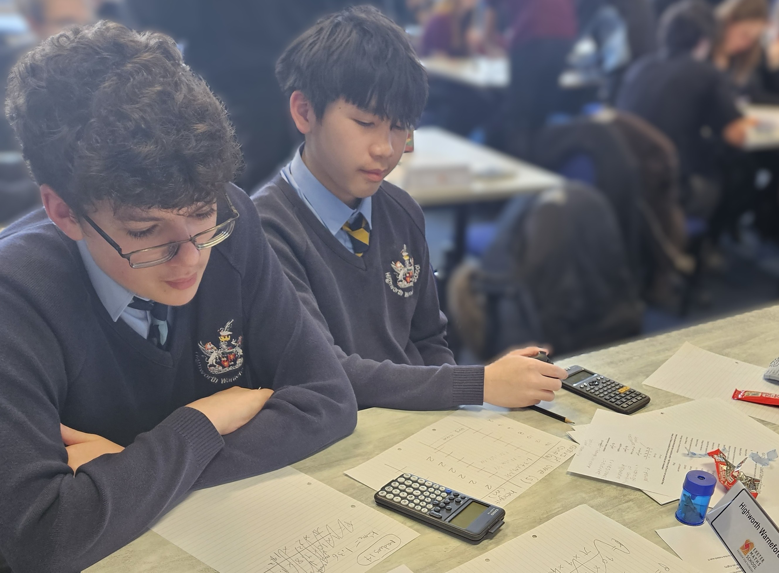 Students working to solve the physics questions 